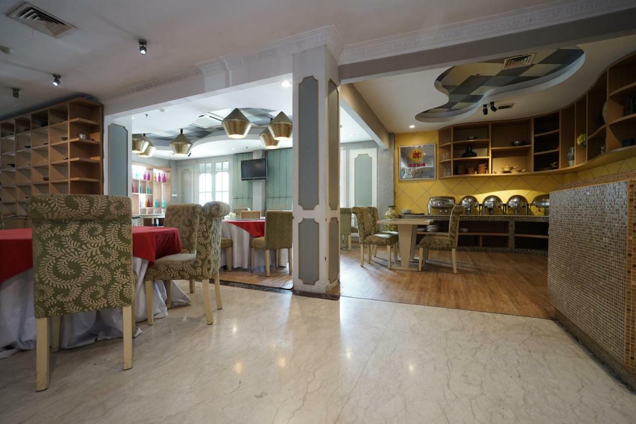 Capital O 1128 Hotel Imara Palembang Kültér fotó