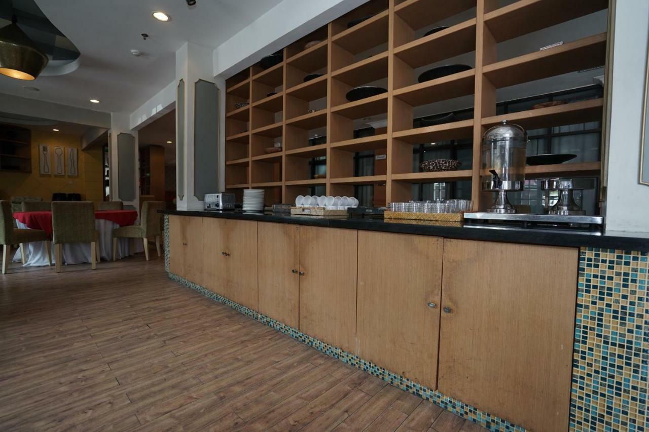 Capital O 1128 Hotel Imara Palembang Kültér fotó