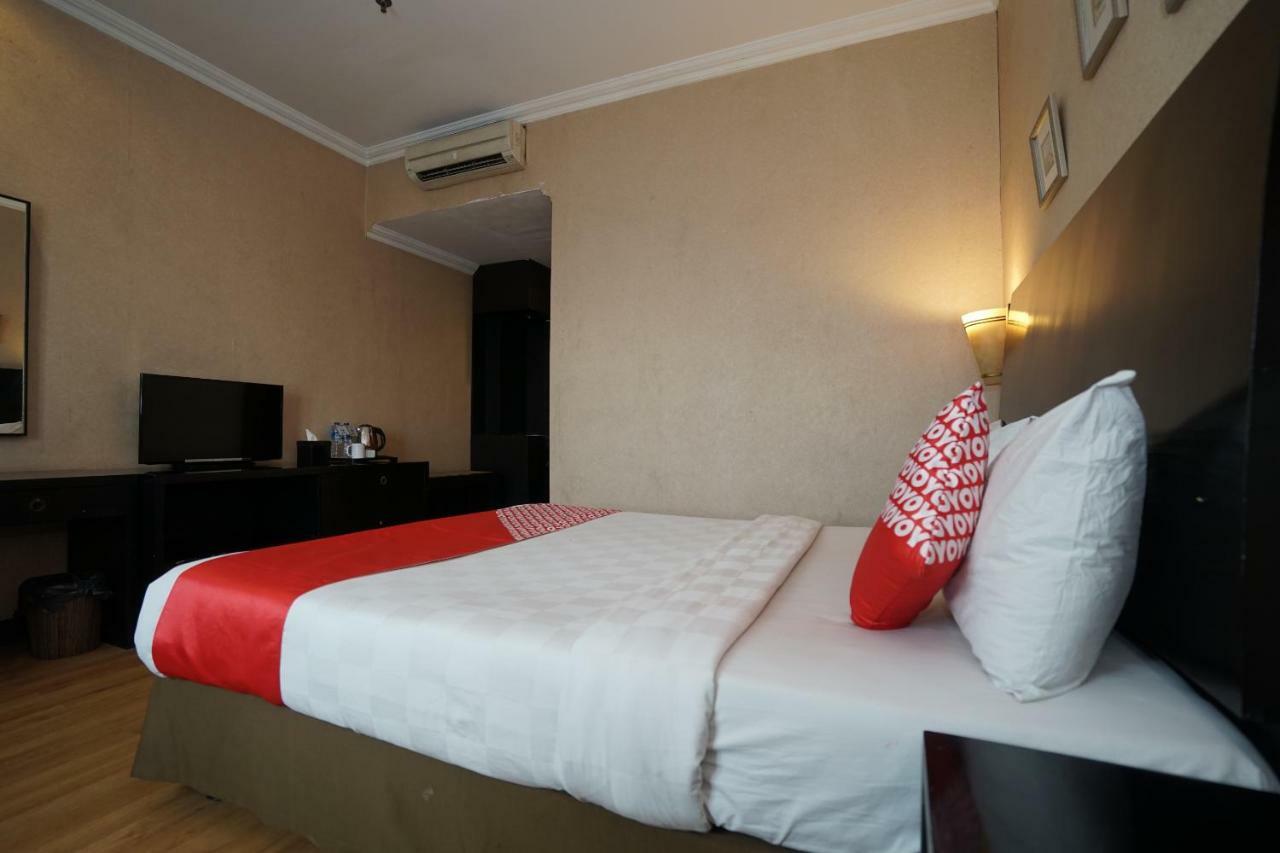 Capital O 1128 Hotel Imara Palembang Kültér fotó